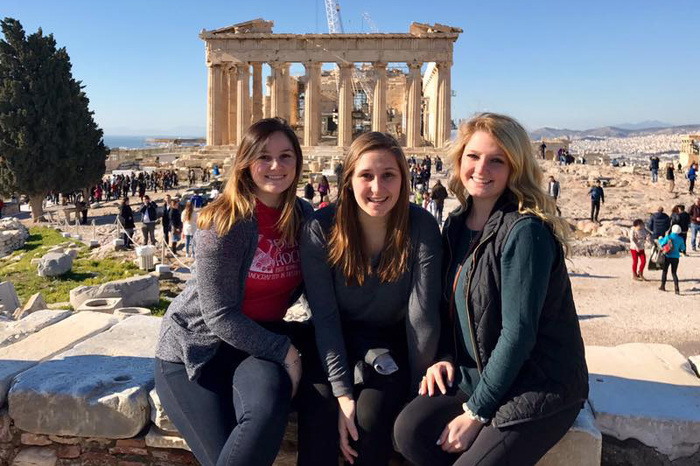 Students posing for a group picture while studying abroad.