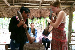 Two students make mole in the Dominican Republic.