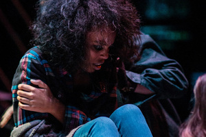 A Luther student performs in "Rent."