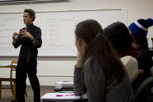 Professor Derek Sweet lectures to students in his communication studies course.