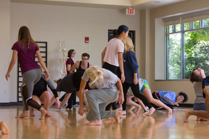 Students participate in a masterclass with PUSH Physical Theatre.