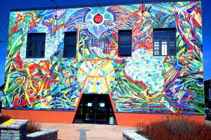 The vibrant exterior of the Resource Center of the Americas in Minneapolis, Minnesota.