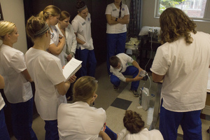 Nursing students participating in a respiratory intervention lab.
