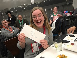 A photo of Becca and her prize...a $25 gift card to a local coffee shop.