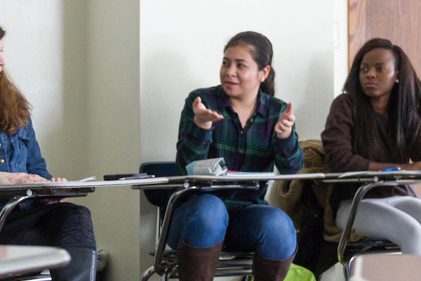 Students participate in a discussion during class.
