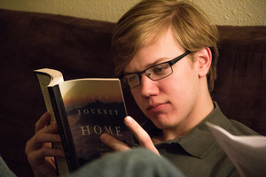 A Luther student reads a book for Philosophy.