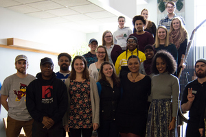 Acclaimed film director Charles Burnett posing for a group picture with students in the African American Influence on Popular Culture course.