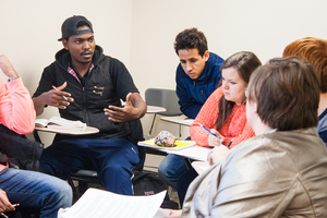 Students having a discussion in the African-American History course, which is a survey of African-American history from the 15th century to the present. Eras and topics include the trans-Atlantic slave trade, slavery in the Americas, the Civil War and Emancipation, segregation, the Great Migration, the Great Depression and World War II, the modern black freedom struggle, and the post-civil rights era.