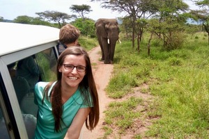 Rozyln Paradis '18 with an elephant while on a safari in Akagera National Park.