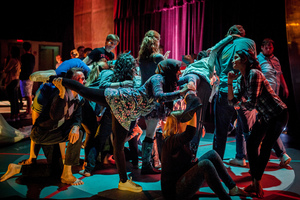 Luther students dance with performers in "The Invitation Game"