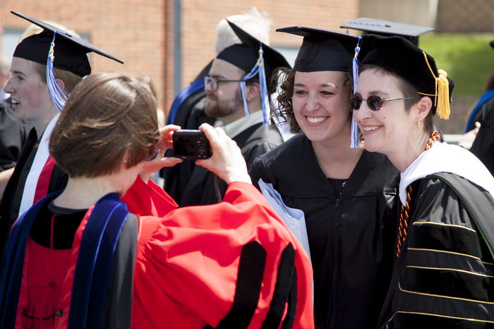 A Luther student posing with Professor Elizabeth Steding at Commencement.
