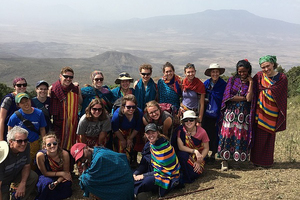 Students pose for a group picture in Maasailand, Kenya during a study abroad trip.