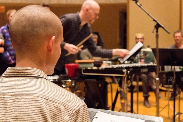 Student composers participate in a workshop/reading session with members of Sō Percussion in 2017.
