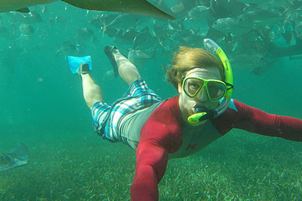 A student goes snorkeling in Belize during J-term 2016.
